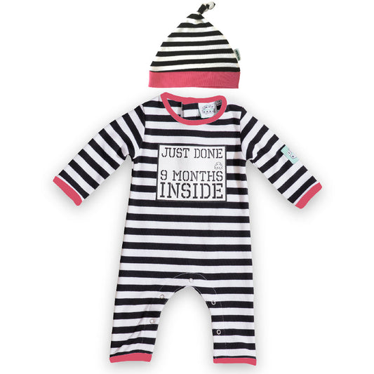 Just Done 9 Months Inside black and white stripy baby grow with pink edging trim and matching hat