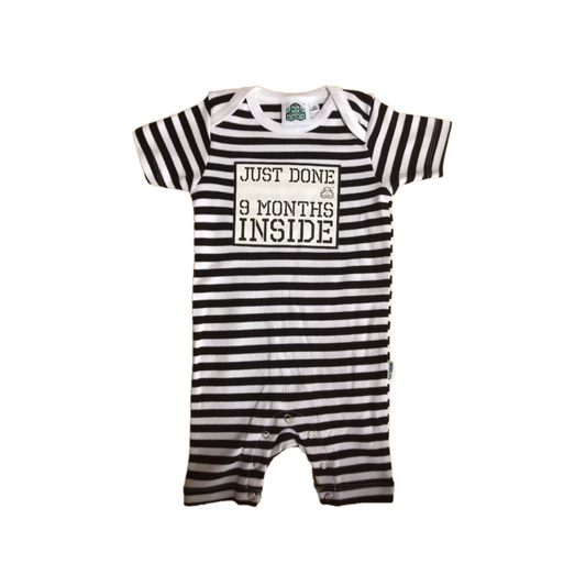 Stripy black and white short sleeve romper suit with popper legs. Features slogan Just Done 9 Months Inside